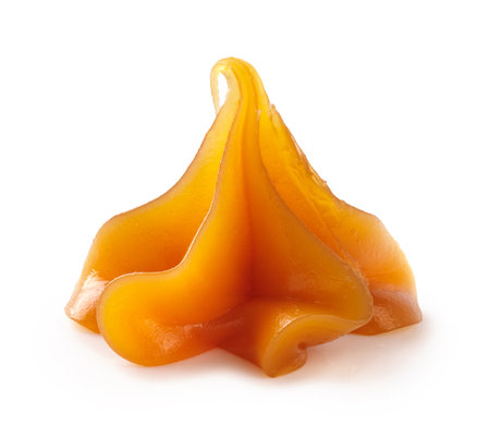 Soft caramel isolated. Melted caramel on white.の写真素材