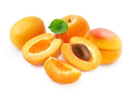 Apricot fruit with half of apricot and apricot kernel isolated on white background.の写真素材