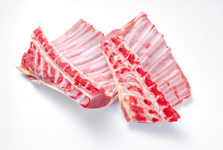 A fresh rack of lamb. Lamb meat isolated on white background.の写真素材