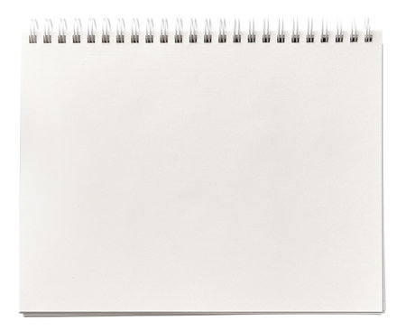 A spiral notebook from top view with empty white coverの写真素材