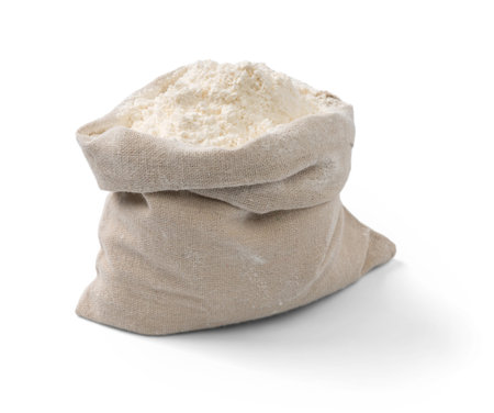 Bag with flour isolated. Flour on white background.の写真素材