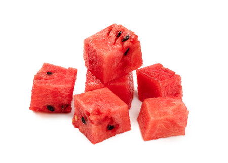 Cubes of watermelon on white background. Pieces of watermelon isolated.の写真素材