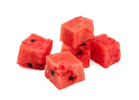 Cubes of watermelon on white background. Pieces of watermelon isolated.の写真素材