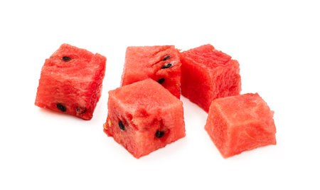 Cubes of watermelon on white background. Pieces of watermelon isolated.の写真素材