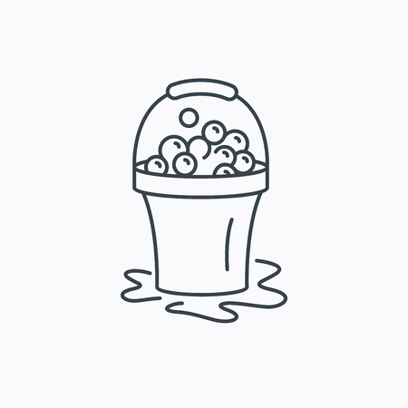 Soapy cleaning icon. Bucket with foam and bubbles sign. Linear outline icon on white background. Vectorのイラスト素材