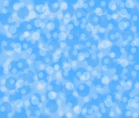 On a blue background blue and white circles of the different sizes are located.The background has an effect bokeh.の写真素材