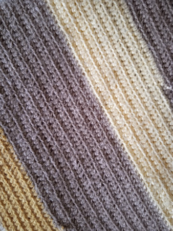 Knitted woolen fabric as a background. Close-up.の写真素材