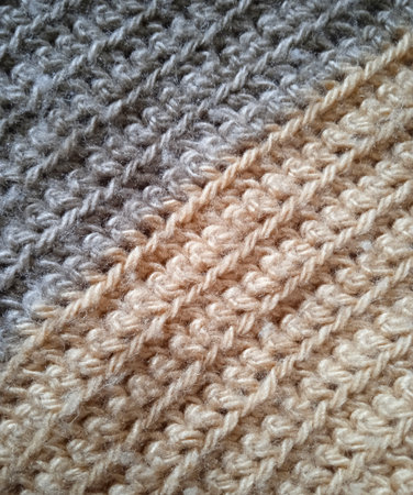 Knitted wool texture. Handmade knitting wool background. Top view.の写真素材