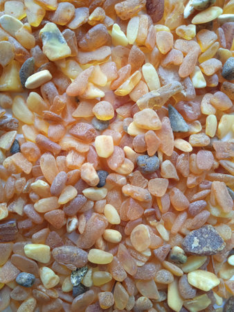 Close up of a pile of orange and yellow stone pebblesの写真素材