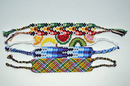 Designer new unique colorful and multi-colored friendship bracelets handmade of thread with knots...