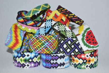Designer new unique colorful and multi-colored friendship bracelets handmade of thread with knots...