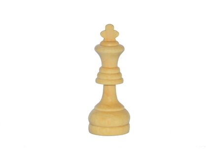 Wooden chess piece of white king isolated on white backgroundの写真素材