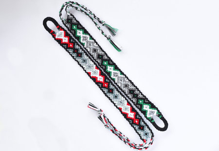 DIY woven friendship bracelets with unusual braiding. Summer accessoryの写真素材