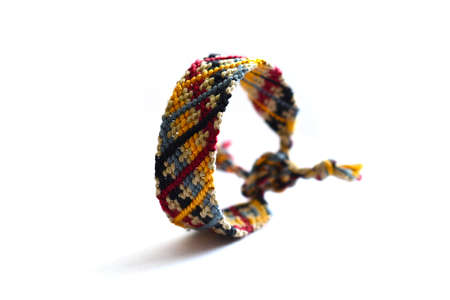 DIY woven friendship bracelets with different braiding. Summer accessoryの写真素材