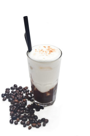 Cold chocolate with coffee beans on white background isolated