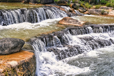 Small waterfall with clear water closeupの写真素材