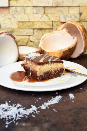Bounty Cake made of fresh coconut on a tableの写真素材
