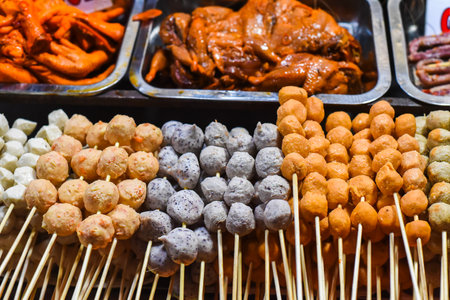 Many snacks and seafood in vietnamese night market in Da Latの写真素材