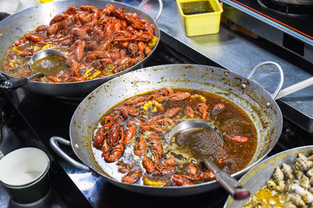 Many seafood lobsters in vietnamese night market in food festivalの写真素材