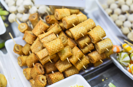 Many snacks and seafood in vietnamese night market in food festivalの写真素材