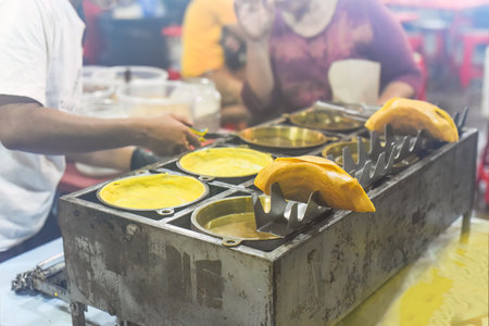 Apam Balik or Apom Balik traditional Malaysian pancake in Jalar Alor street food in Kuala Lumpurの写真素材