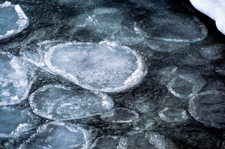 Dark frozen water of Japanese sea