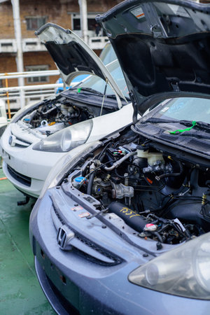 Vladivostok, Russia - 3 March 2024: unloading of new car from the ship in sea port of Vladivostok,...
