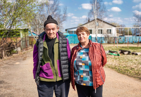 Portrait of 75 years old grandparents in russian village togetherの写真素材