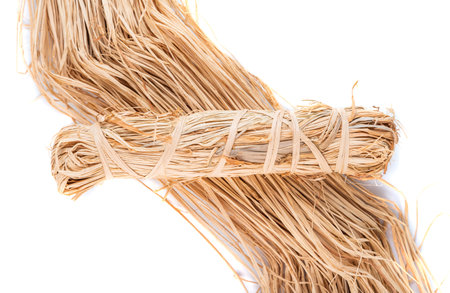 Raphia skein natural color on white backgroundの写真素材