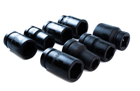 Set of heavy-duty impact sockets in various sizes arranged on a white background, ideal for...