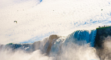 Water rushing over Niagara Falls, New York USAの写真素材