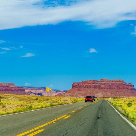 A road leading to Monument Valley, Kayenta Arizonaの写真素材
