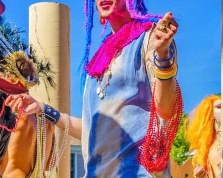 People walking in the 39th Annual Provincetown Carnival Gods and Goddess Parade on Commercial Street in Provincetown, Massachusetts August 17, 2017 USAのeditorial素材