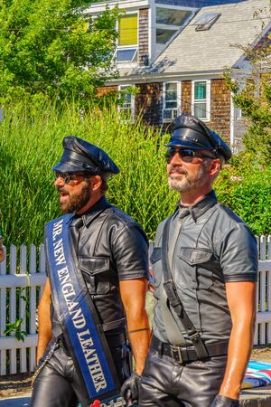 People walking in the 39th Annual Provincetown Carnival Gods and Goddess Parade on Commercial Street in Provincetown, Massachusetts August 17, 2017 USAのeditorial素材
