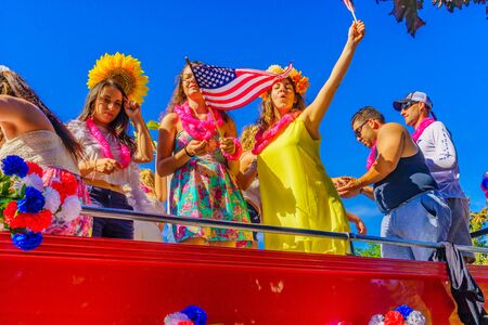 People walking in the 39th Annual Provincetown Carnival Gods and Goddess Parade on Commercial Street in Provincetown, Massachusetts August 17, 2017 USAのeditorial素材