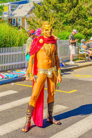 People walking in the 39th Annual Provincetown Carnival Gods and Goddess Parade on Commercial Street in Provincetown, Massachusetts August 17, 2017 USAのeditorial素材