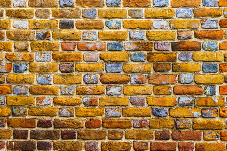 Old brick colored brick masonry background