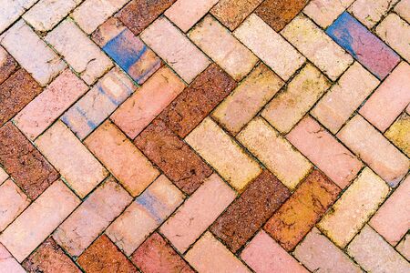 Old brick colored brick masonry backgroundの写真素材