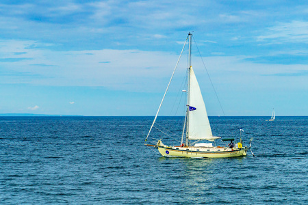 Provincetown, Cape Cod, Massachusetts, US - August 15, 2017 yacht and his crew looking for a whaleのeditorial素材
