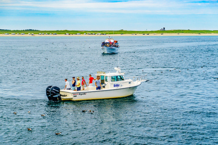 Provincetown, Cape Cod, Massachusetts, US - August 15, 2017 Ship and boat looking for a whaleのeditorial素材