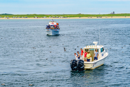 Provincetown, Cape Cod, Massachusetts, US - August 15, 2017 Ship and boat looking for a whaleのeditorial素材