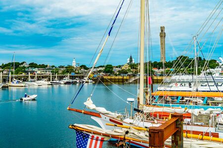 Provincetown Marina and Pilgrim Monument, Provincetown MA US.の写真素材