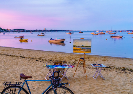 Provincetown, MA, USA - August 12 2017 Canvas, easel, bicycle, ships and boats in the Provincetown Marina during sunsetのeditorial素材