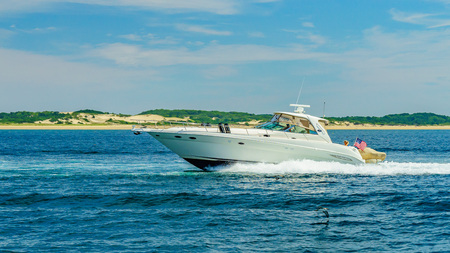 Provincetown, Cape Cod, Massachusetts, US - August 15, 2017 Boat and his crew looking for a whaleのeditorial素材