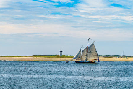  wo-masted yacht and Beautiful landscape of ocean beach Cape cod Massachusetts USの写真素材