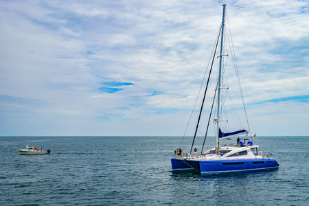 Provincetown, Cape Cod, Massachusetts, US - August 15, 2017 Catamaran and his crew looking for a whaleのeditorial素材