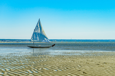 Yacht and Beautiful landscape of ocean beach Cape cod Massachusettsの写真素材
