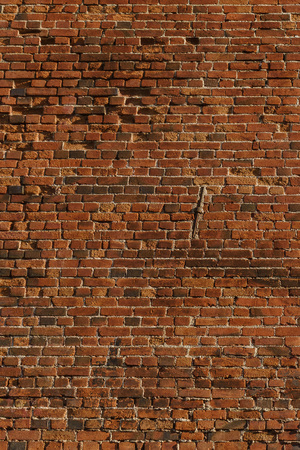 Old red brick wall texture Ekaterinburg Russiaの写真素材