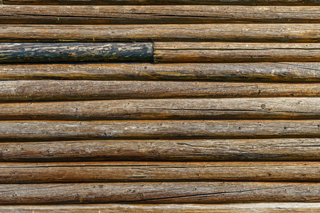 Horizontal old wood background from planed logs.の写真素材
