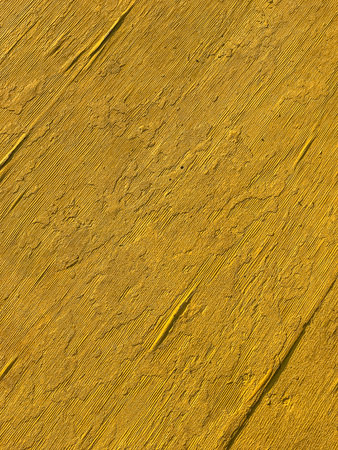 background of old yellowish plywood surface board.の写真素材
